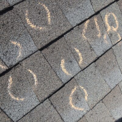 "roof storm damage marks"