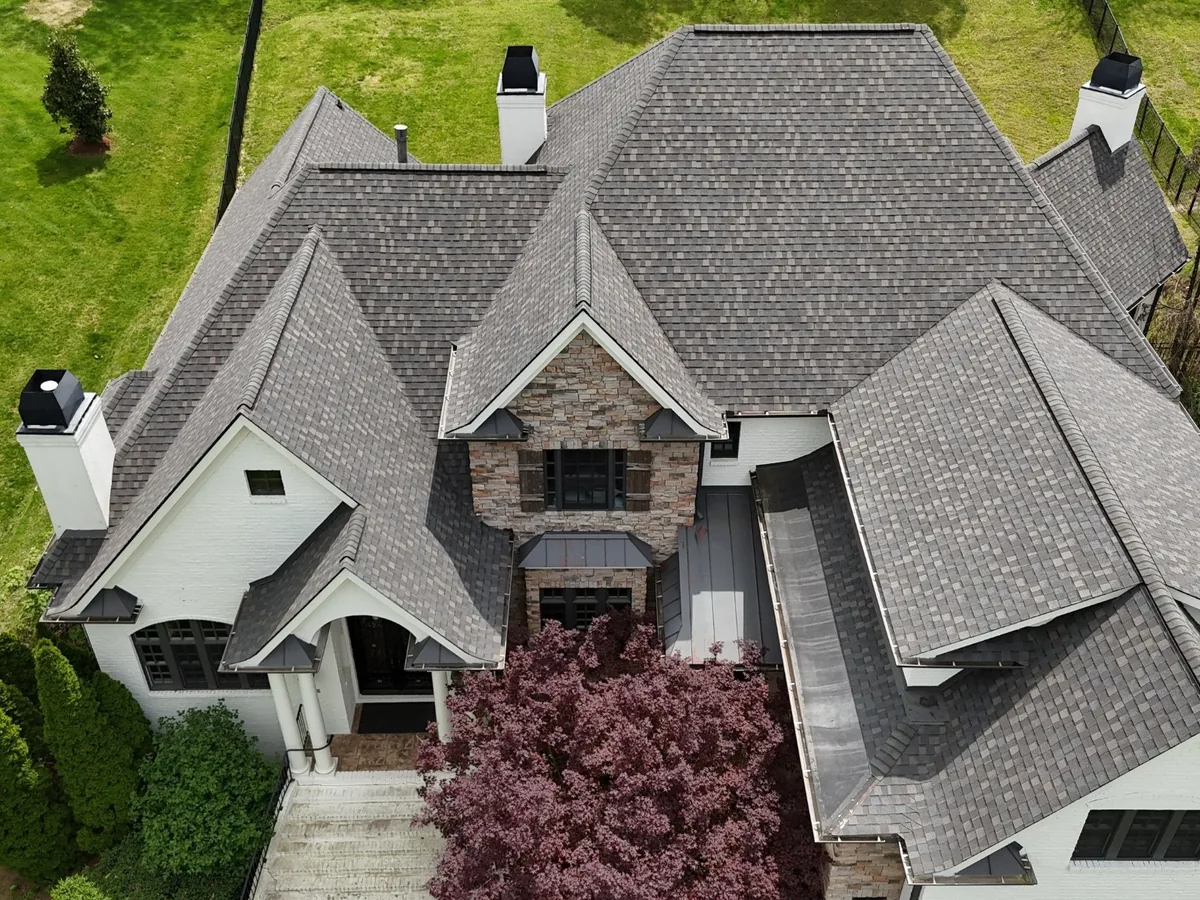 Aerial view of a completed asphalt shingle roof replacement in Columbia, TN